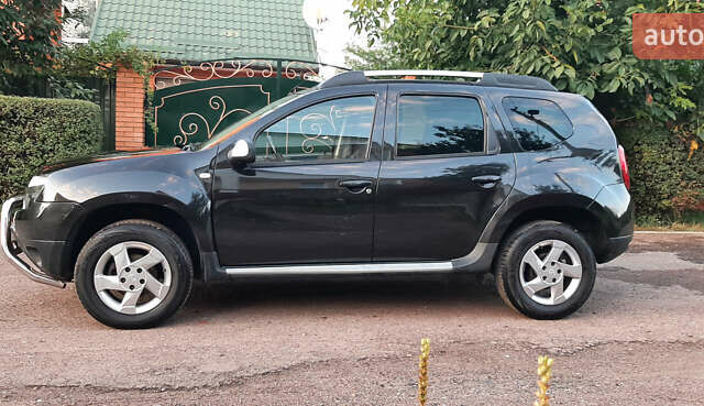 Чорний Дачія Duster, об'ємом двигуна 1.6 л та пробігом 210 тис. км за 9199 $, фото 1 на Automoto.ua