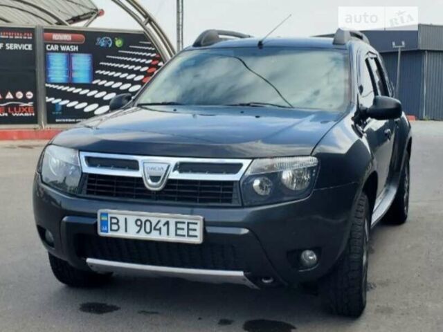 Черный Дачия Duster, объемом двигателя 1.6 л и пробегом 238 тыс. км за 8400 $, фото 1 на Automoto.ua