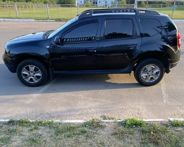 Чорний Дачія Duster, об'ємом двигуна 1.6 л та пробігом 227 тис. км за 10850 $, фото 1 на Automoto.ua
