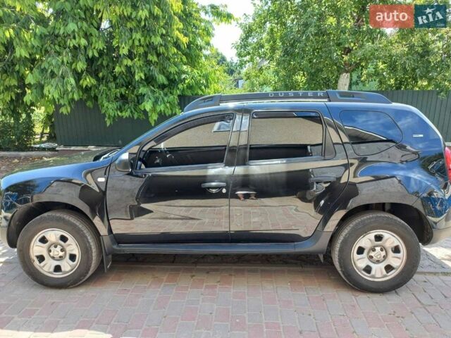 Черный Дачия Duster, объемом двигателя 1.6 л и пробегом 163 тыс. км за 11200 $, фото 1 на Automoto.ua