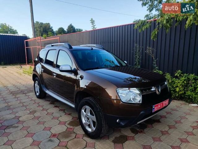 Коричневый Дачия Duster, объемом двигателя 1.6 л и пробегом 162 тыс. км за 9400 $, фото 1 на Automoto.ua