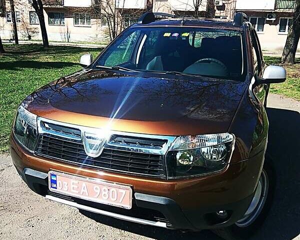 Коричневый Дачия Duster, объемом двигателя 1.6 л и пробегом 196 тыс. км за 9600 $, фото 1 на Automoto.ua