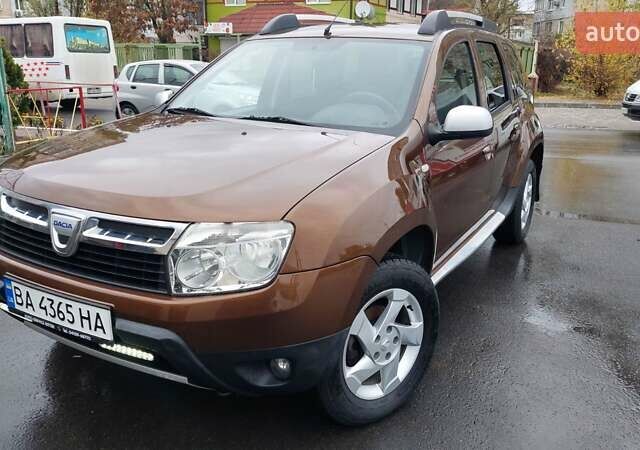 Коричневый Дачия Duster, объемом двигателя 1.6 л и пробегом 225 тыс. км за 7900 $, фото 1 на Automoto.ua
