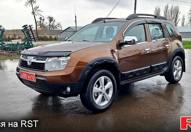 Коричневый Дачия Duster, объемом двигателя 15 л и пробегом 164 тыс. км за 10300 $, фото 1 на Automoto.ua