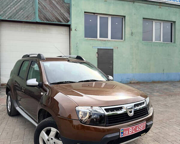 Коричневий Дачія Duster, об'ємом двигуна 1.6 л та пробігом 193 тис. км за 9100 $, фото 1 на Automoto.ua