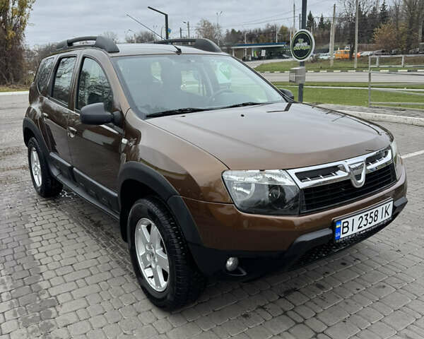 Коричневий Дачія Duster, об'ємом двигуна 1.6 л та пробігом 183 тис. км за 10499 $, фото 1 на Automoto.ua
