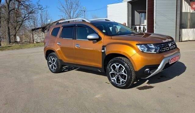 Помаранчевий Дачія Duster, об'ємом двигуна 1.5 л та пробігом 107 тис. км за 17800 $, фото 1 на Automoto.ua