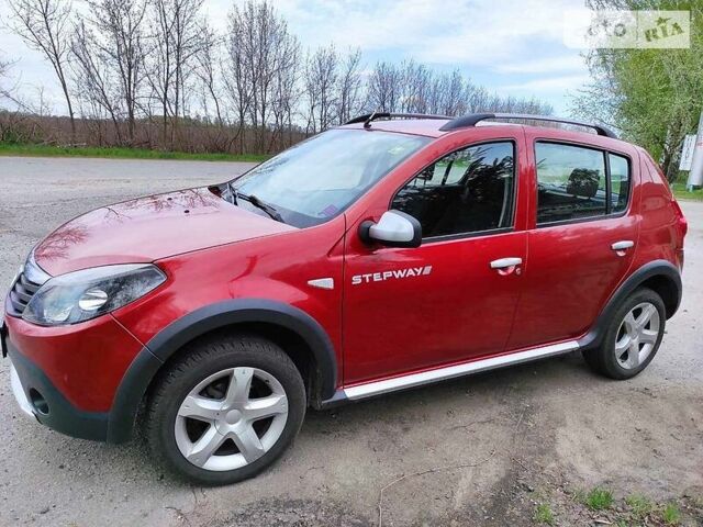 Красный Дачия Sandero StepWay, объемом двигателя 1.6 л и пробегом 143 тыс. км за 6750 $, фото 1 на Automoto.ua