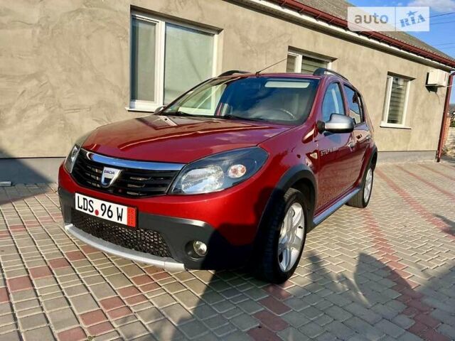 Красный Дачия Sandero StepWay, объемом двигателя 1.6 л и пробегом 161 тыс. км за 6950 $, фото 1 на Automoto.ua