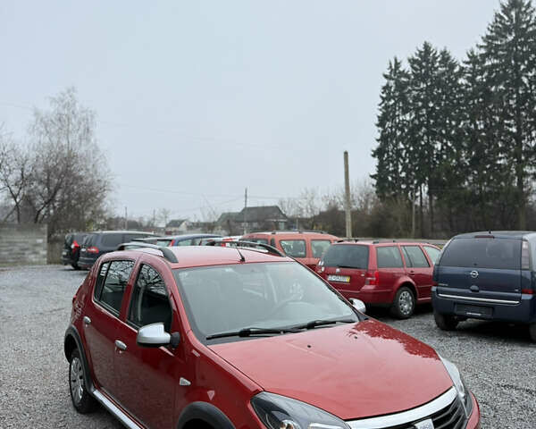 Красный Дачия Sandero StepWay, объемом двигателя 1.6 л и пробегом 171 тыс. км за 4999 $, фото 1 на Automoto.ua