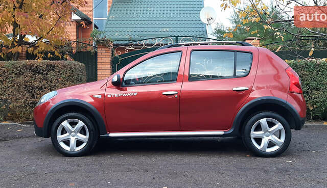 Красный Дачия Sandero StepWay, объемом двигателя 1.6 л и пробегом 183 тыс. км за 6850 $, фото 1 на Automoto.ua