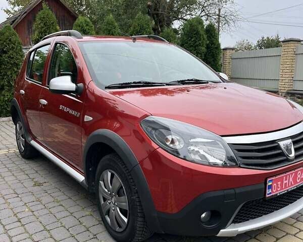 Красный Дачия Sandero StepWay, объемом двигателя 1.6 л и пробегом 117 тыс. км за 6900 $, фото 1 на Automoto.ua
