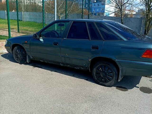 Сірий Деу Есперо, об'ємом двигуна 2 л та пробігом 400 тис. км за 1000 $, фото 1 на Automoto.ua