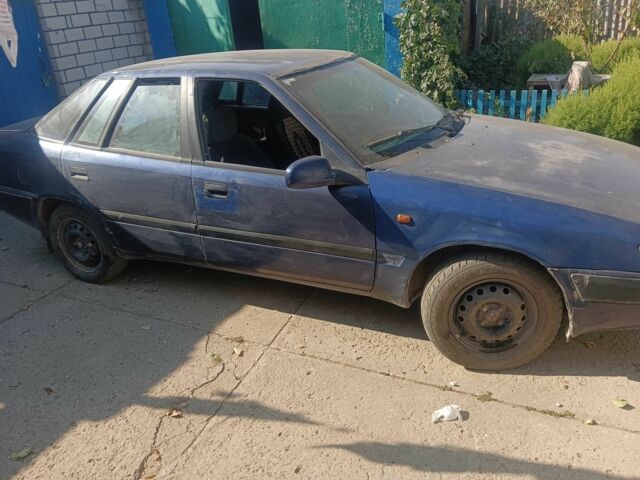 Синий Дэу Эсперо, объемом двигателя 2 л и пробегом 320 тыс. км за 550 $, фото 1 на Automoto.ua