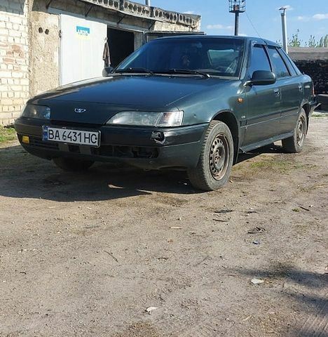 Зеленый Дэу Эсперо, объемом двигателя 2 л и пробегом 250 тыс. км за 1350 $, фото 1 на Automoto.ua