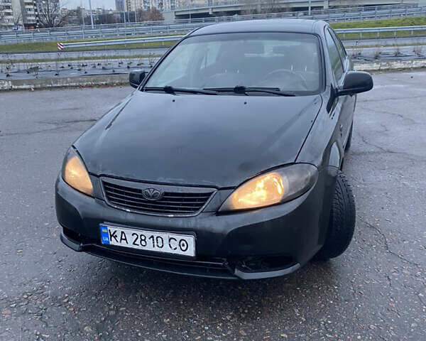 Черный Дэу Джентра, объемом двигателя 1.49 л и пробегом 221 тыс. км за 4000 $, фото 1 на Automoto.ua