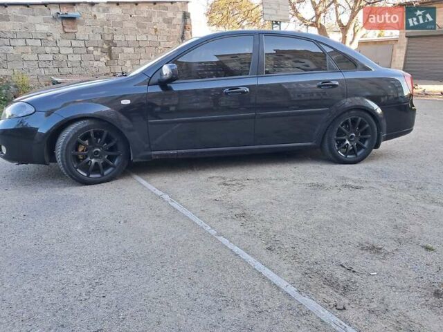 Черный Дэу Джентра, объемом двигателя 1.49 л и пробегом 203 тыс. км за 4700 $, фото 1 на Automoto.ua