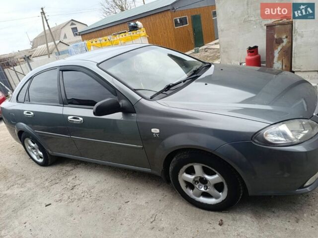 Сірий Деу Джентра, об'ємом двигуна 1.49 л та пробігом 322 тис. км за 5000 $, фото 1 на Automoto.ua