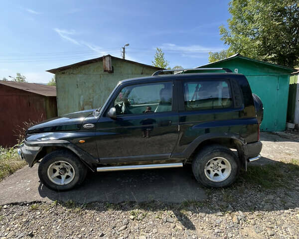 Чорний Деу Корандо, об'ємом двигуна 2.87 л та пробігом 240 тис. км за 7000 $, фото 1 на Automoto.ua