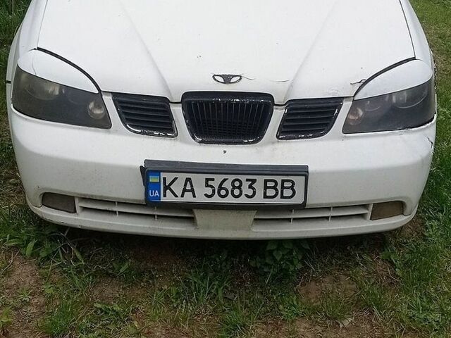 Белый Дэу Лачетти, объемом двигателя 1.5 л и пробегом 230 тыс. км за 650 $, фото 1 на Automoto.ua