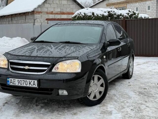 Черный Дэу Лачетти, объемом двигателя 1.8 л и пробегом 176 тыс. км за 3800 $, фото 1 на Automoto.ua