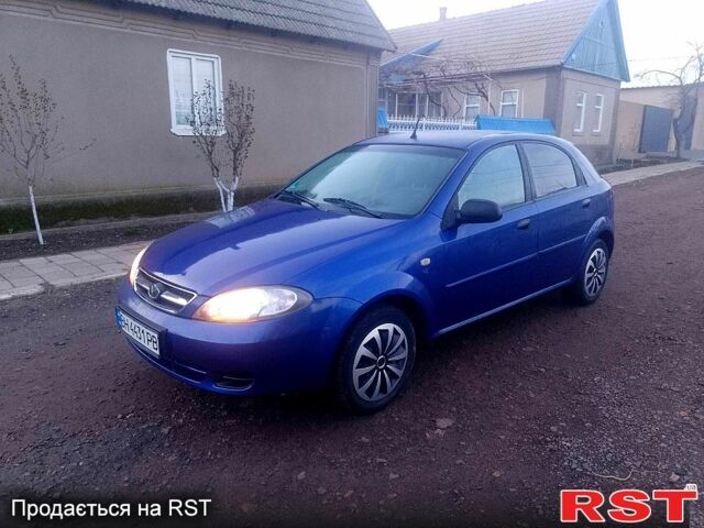 Синий Дэу Лачетти, объемом двигателя 1.4 л и пробегом 162 тыс. км за 3400 $, фото 1 на Automoto.ua