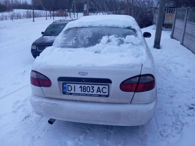 Белый Дэу Ланос, объемом двигателя 1.5 л и пробегом 300 тыс. км за 786 $, фото 1 на Automoto.ua