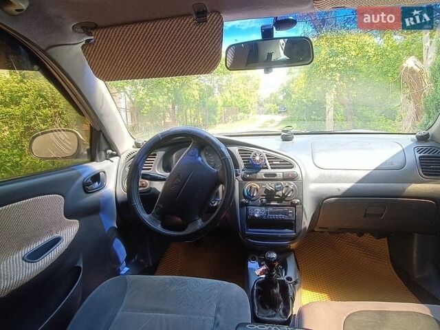 Белый Дэу Ланос, объемом двигателя 1.5 л и пробегом 275 тыс. км за 1700 $, фото 1 на Automoto.ua