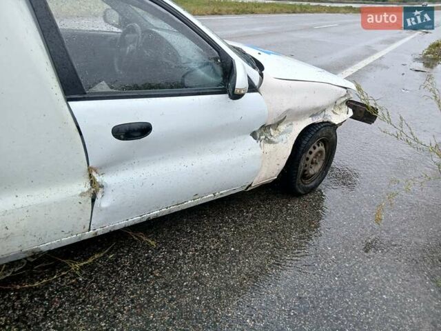 Білий Деу Ланос, об'ємом двигуна 1.6 л та пробігом 289 тис. км за 900 $, фото 1 на Automoto.ua