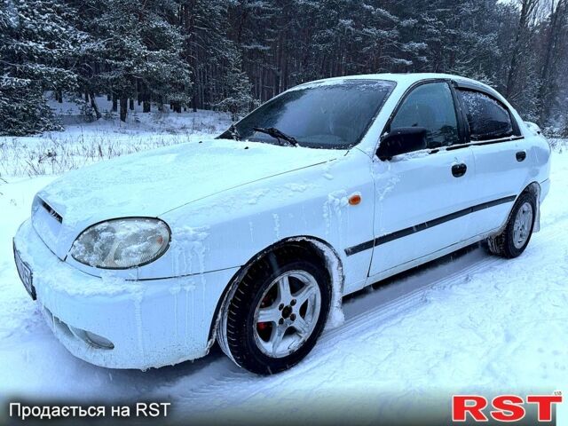 Белый Дэу Ланос, объемом двигателя 1.5 л и пробегом 225 тыс. км за 1950 $, фото 1 на Automoto.ua