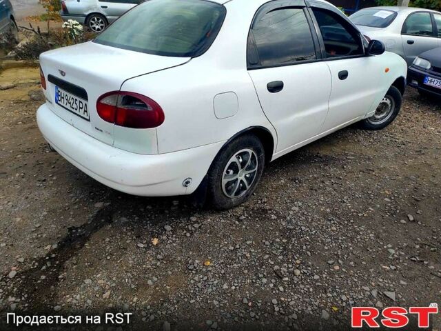 Белый Дэу Ланос, объемом двигателя 1.5 л и пробегом 300 тыс. км за 800 $, фото 1 на Automoto.ua