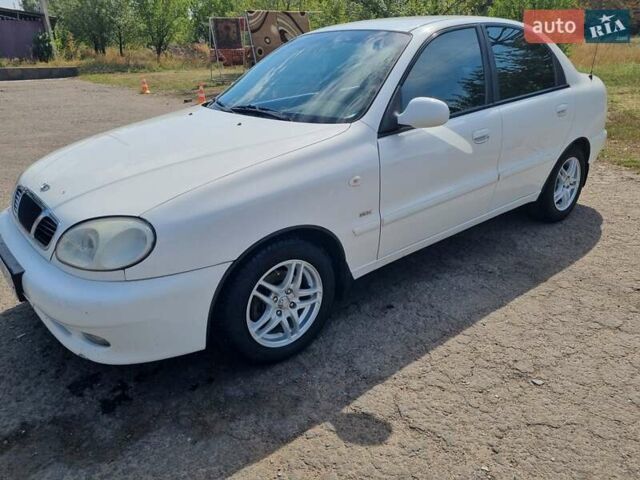 Белый Дэу Ланос, объемом двигателя 1.6 л и пробегом 320 тыс. км за 3500 $, фото 1 на Automoto.ua