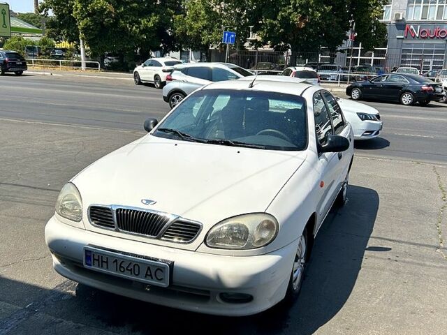 Белый Дэу Ланос, объемом двигателя 1.5 л и пробегом 245 тыс. км за 2200 $, фото 1 на Automoto.ua