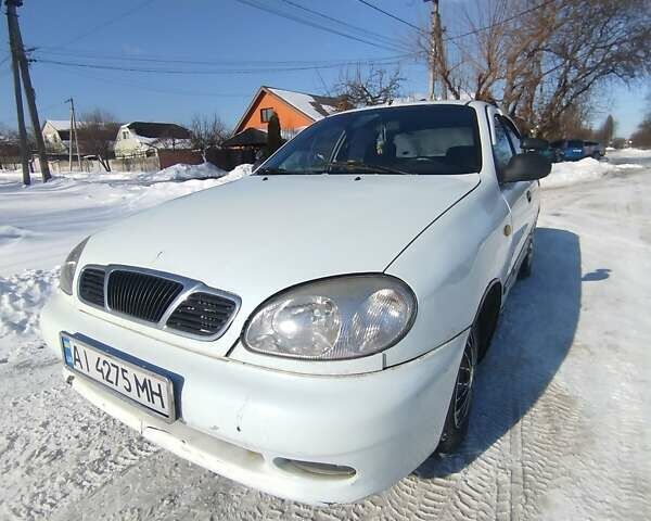 Белый Дэу Ланос, объемом двигателя 1.5 л и пробегом 400 тыс. км за 1050 $, фото 1 на Automoto.ua