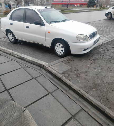 Білий Деу Ланос, об'ємом двигуна 1.5 л та пробігом 260 тис. км за 1800 $, фото 1 на Automoto.ua