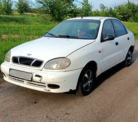Белый Дэу Ланос, объемом двигателя 1.5 л и пробегом 175 тыс. км за 1560 $, фото 1 на Automoto.ua
