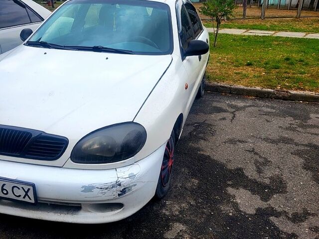 Белый Дэу Ланос, объемом двигателя 1.5 л и пробегом 250 тыс. км за 1450 $, фото 1 на Automoto.ua