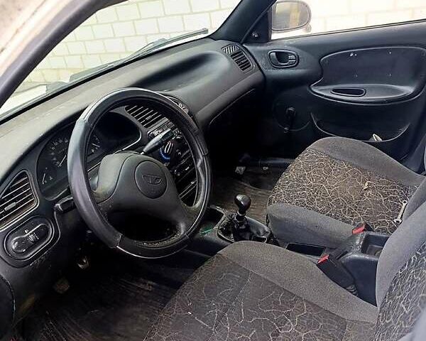 Білий Деу Ланос, об'ємом двигуна 1.3 л та пробігом 80 тис. км за 990 $, фото 1 на Automoto.ua