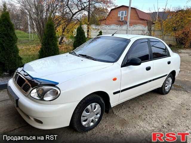 Белый Дэу Ланос, объемом двигателя 1.5 л и пробегом 204 тыс. км за 2450 $, фото 1 на Automoto.ua
