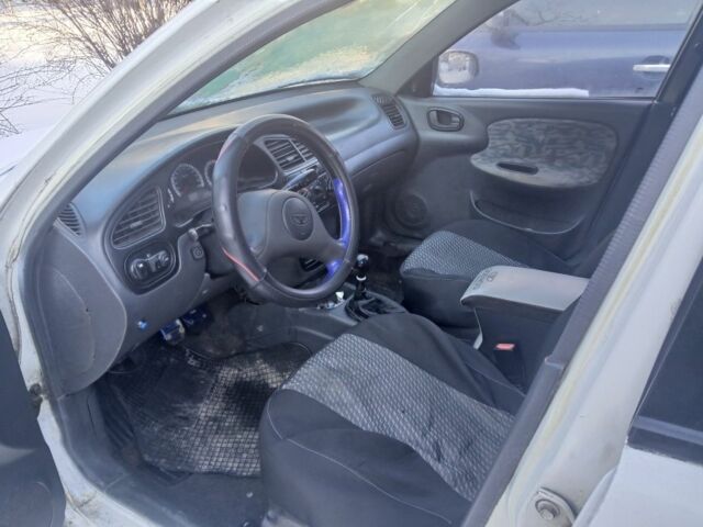 Белый Дэу Ланос, объемом двигателя 1.5 л и пробегом 15 тыс. км за 1100 $, фото 1 на Automoto.ua