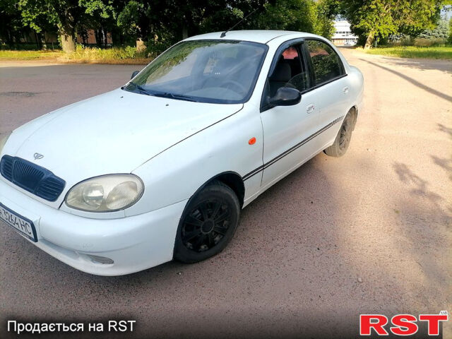 Белый Дэу Ланос, объемом двигателя 1.5 л и пробегом 240 тыс. км за 1900 $, фото 1 на Automoto.ua