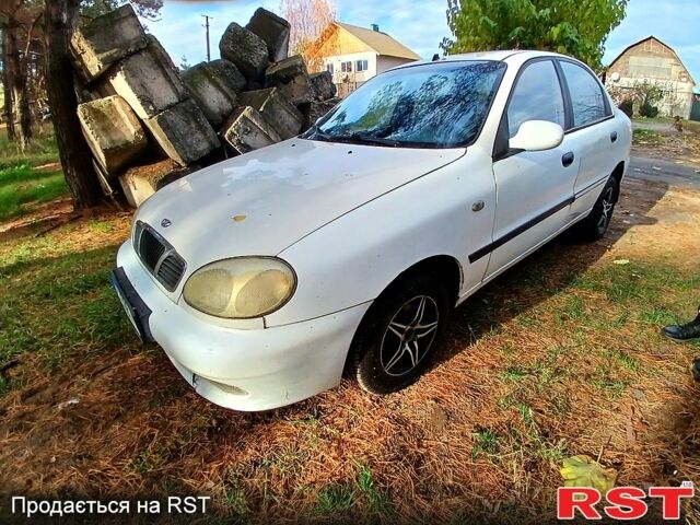 Белый Дэу Ланос, объемом двигателя 1.4 л и пробегом 230 тыс. км за 1200 $, фото 1 на Automoto.ua