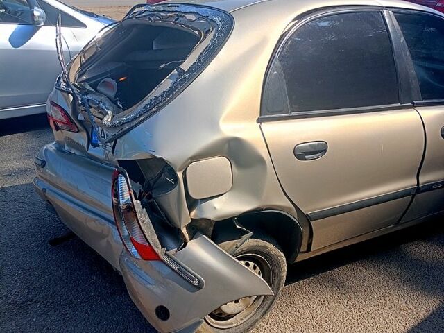 Бежевый Дэу Ланос, объемом двигателя 1.5 л и пробегом 262 тыс. км за 600 $, фото 1 на Automoto.ua