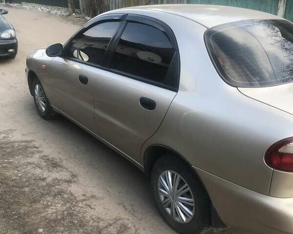 Бежевий Деу Ланос, об'ємом двигуна 1.5 л та пробігом 100 тис. км за 2800 $, фото 1 на Automoto.ua