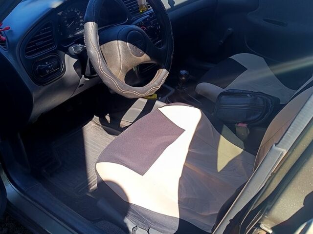 Бежевый Дэу Ланос, объемом двигателя 1.4 л и пробегом 193 тыс. км за 2740 $, фото 1 на Automoto.ua