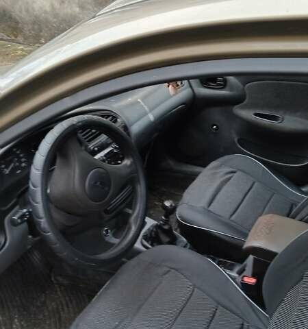 Бежевый Дэу Ланос, объемом двигателя 1.39 л и пробегом 288 тыс. км за 1100 $, фото 1 на Automoto.ua