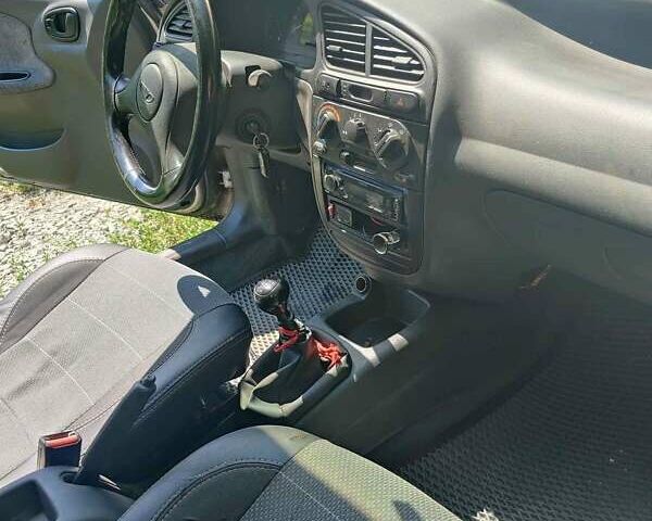 Бежевый Дэу Ланос, объемом двигателя 1.5 л и пробегом 199 тыс. км за 2400 $, фото 1 на Automoto.ua