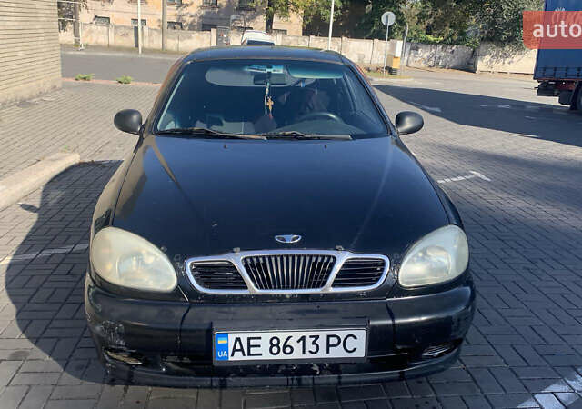 Чорний Деу Ланос, об'ємом двигуна 1.5 л та пробігом 300 тис. км за 1200 $, фото 1 на Automoto.ua