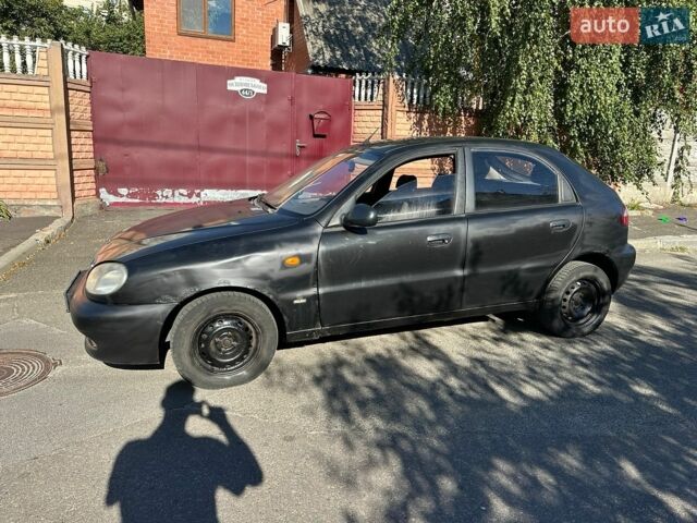 Чорний Деу Ланос, об'ємом двигуна 1.5 л та пробігом 292 тис. км за 1050 $, фото 1 на Automoto.ua