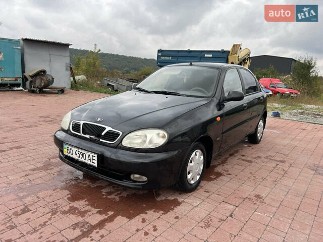 Чорний Деу Ланос, об'ємом двигуна 1.5 л та пробігом 189 тис. км за 1450 $, фото 1 на Automoto.ua